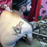 Inked at the uprising: Iraq's teenage tattoo artist