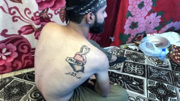 Inked at the uprising: Iraq's teenage tattoo artist